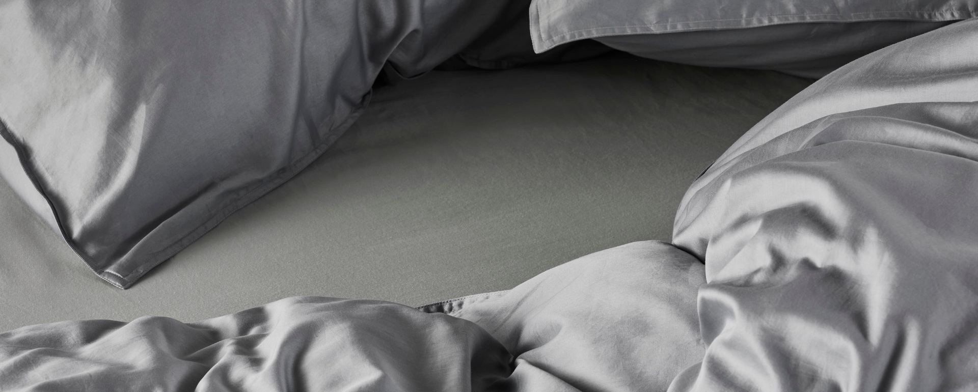 ESSENZA Minte Global grey Spannbettlaken 80 x 200 cm
